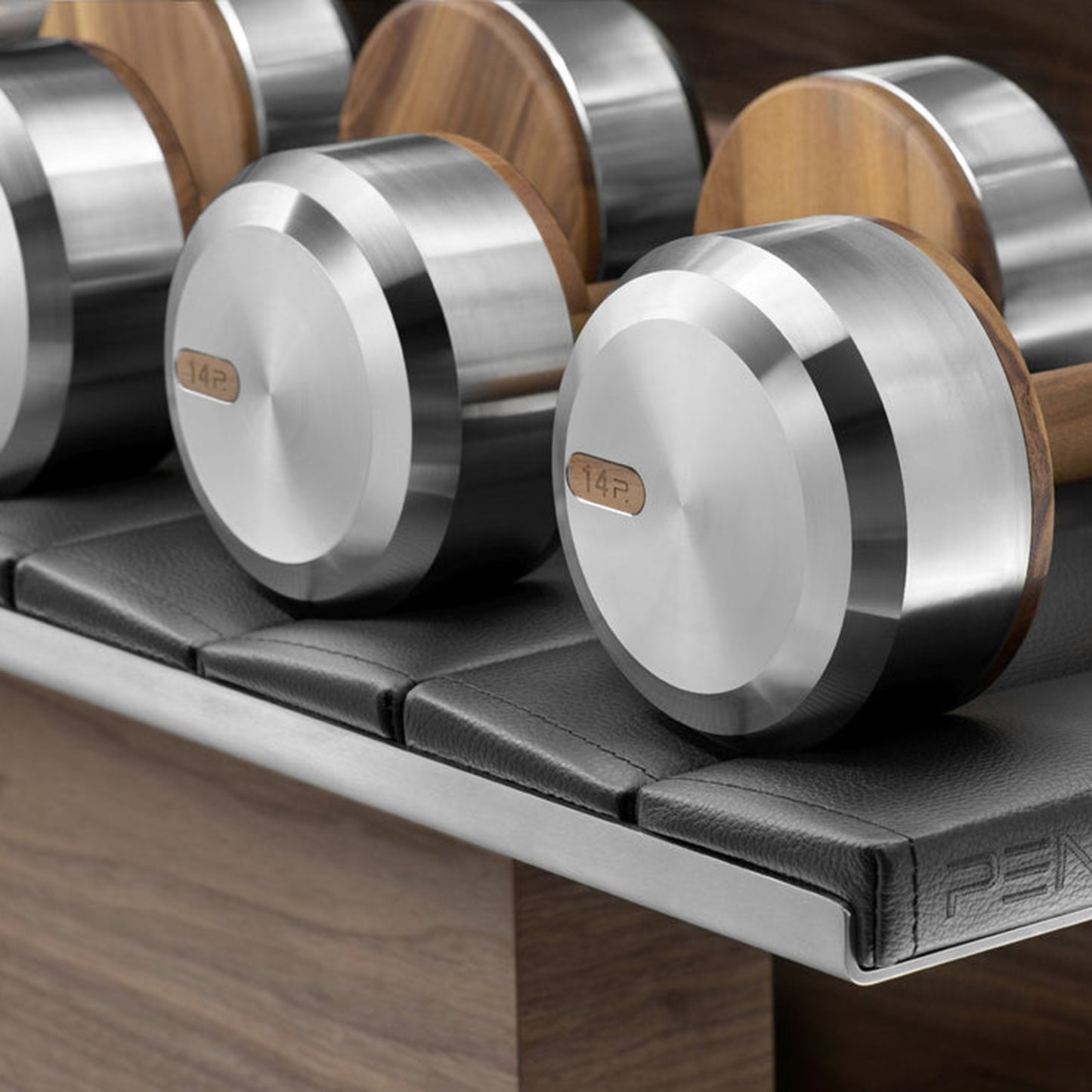 Close up view of the dumbbells, PENT. COLMIA Set - Dumbbells on a Horizontal Wooden Stand