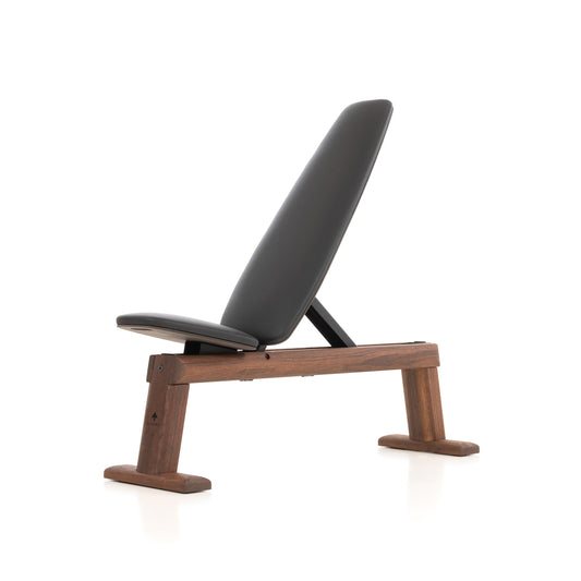Close up view of a luxury home gym equipment, weight bench crafted with solid walnut wood and premium leather. NOHRD WeightBench - Adjustable Exercise Bench