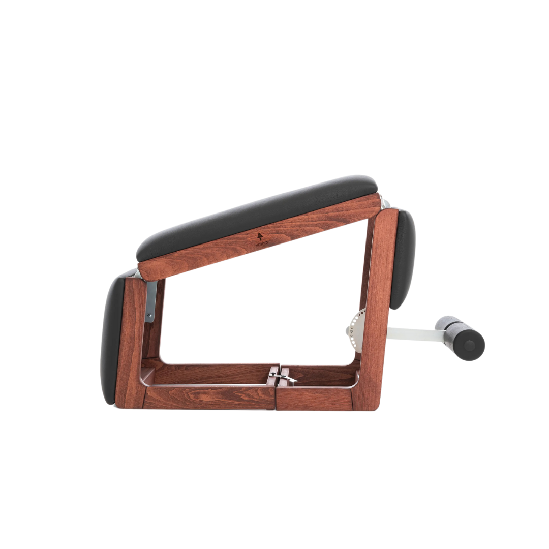 A multifunctional exercise bench made with natural club wood and premium Italian leather, for a broad range of exercises. NOHRD TriaTrainer