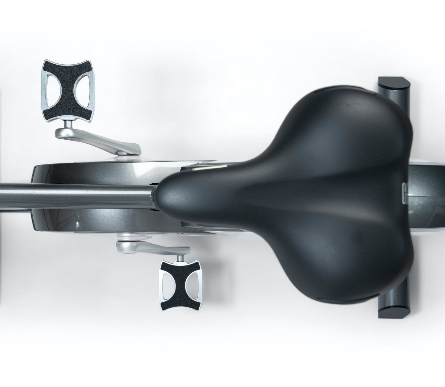 Close up view of the saddle for the stylish modern exercise bike with a sleek design, featuring three adjustable grip positions and a multifunctional console. Stil-Fit Ergometer Pure - Stationary Bike