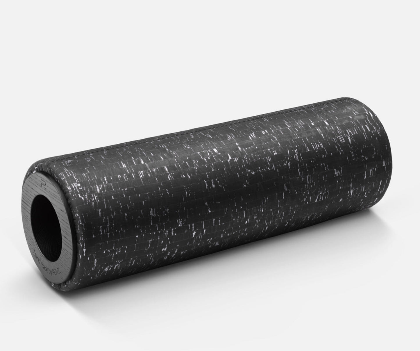 Close up view of the luxury stretching roller made with natural cock and Italian leather in silver color option. PENT. ROLA Cork - Luxury Cork Stretching Roller