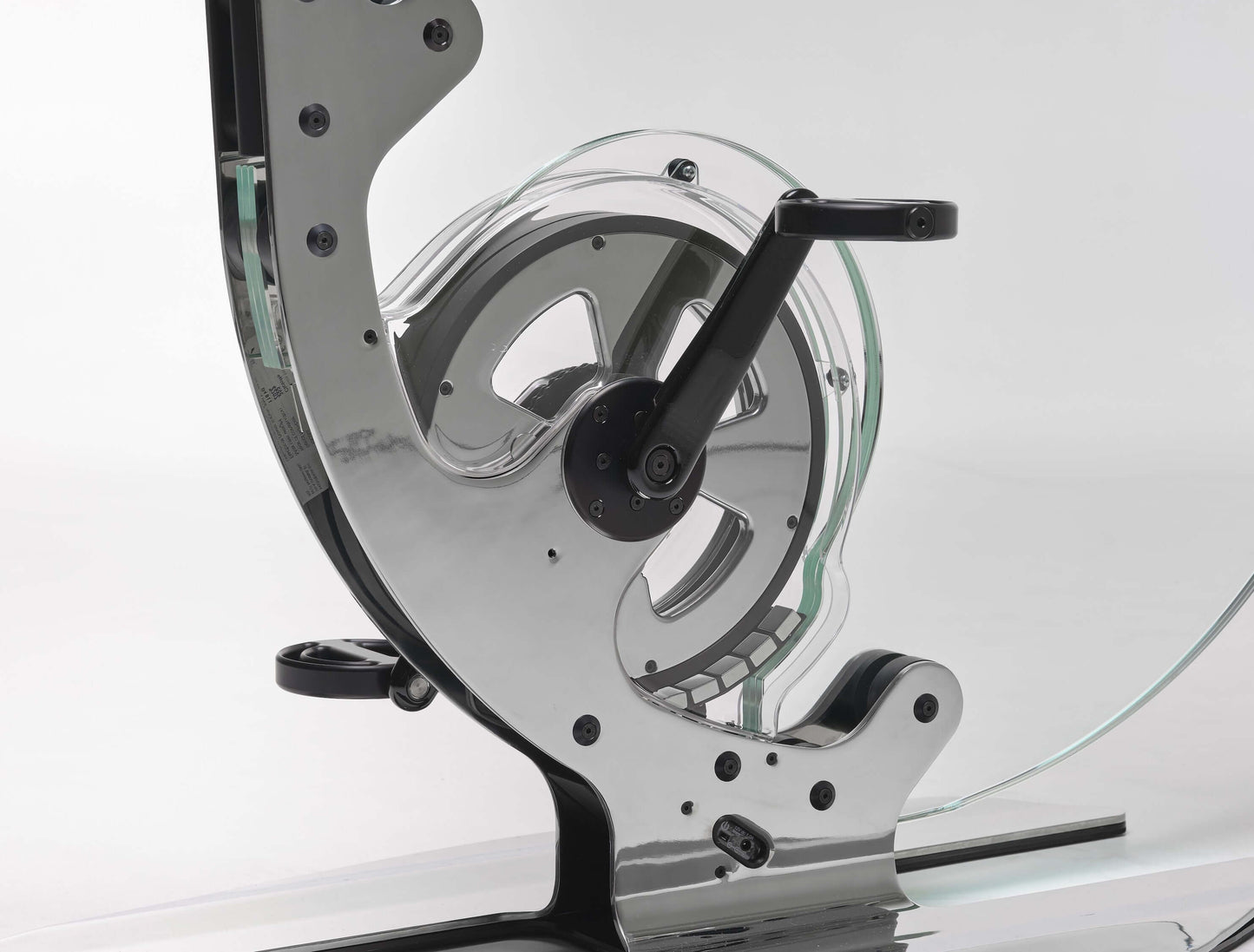 Extremely close up view of a luxurious gym equipment, Italian design exercise bike made of crystal glass. Ciclotte Teckell - Glass Exercise Bike
