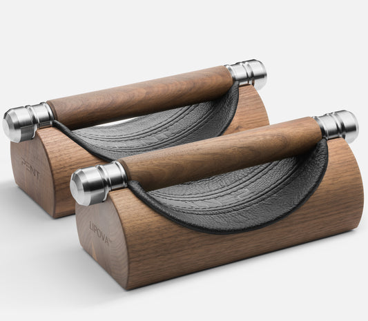 PENT - LIPOVA Push-Up Bars featuring a sleek design crafted from fine leather, stainless steel, and Walnut or Ash wood. Curated by Cycling Bears, known for excellent grip and antibacterial properties. Available in Singapore and Australia, worldwide shipping available.