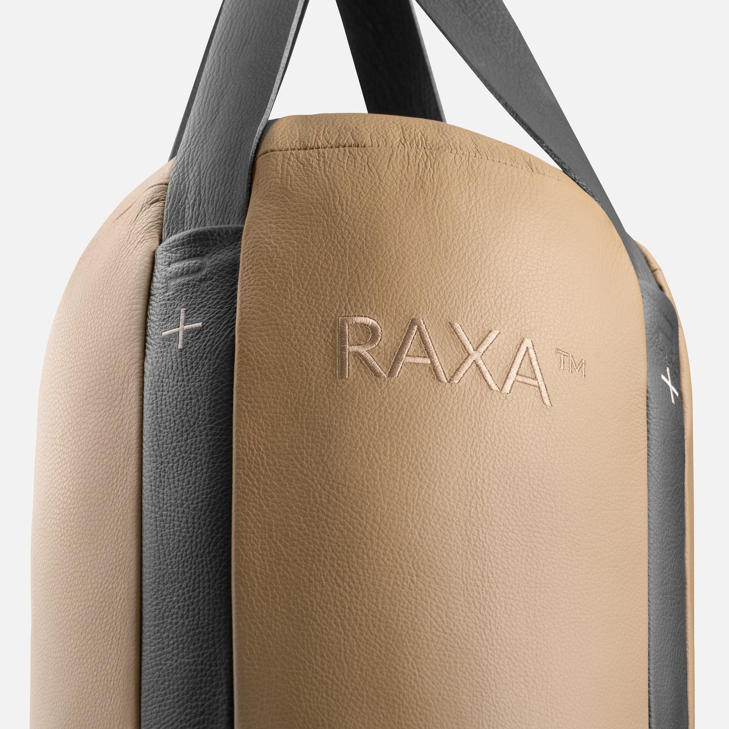 PENT RAXA Boxing Bag. Luxury punching bag and gloves. Bespoke leather furnishings. Handmade fitness equipment. Cycling Bears.
