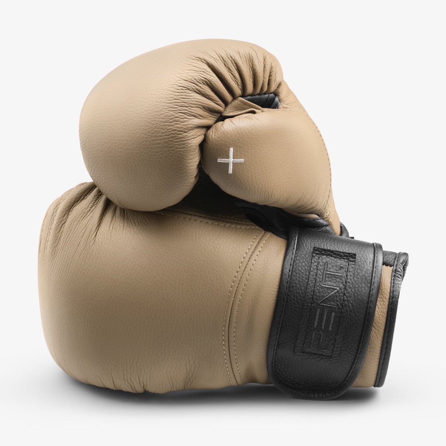 PENT RAXA Boxing Bag. Luxury punching bag and gloves. Bespoke leather furnishings. Handmade fitness equipment. Cycling Bears.