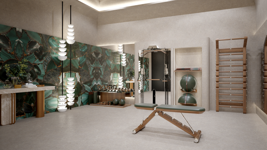 Luxury hospitality gym with green marble wall, cable machine, and functional training equipment