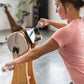 A fitness model using the luxury gym equipment, water grinder for cardio workout. NOHRD WaterGrinder.