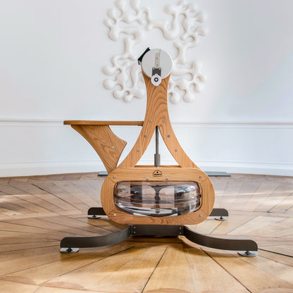 Luxury gym equipment, made with natural oak wood, in a luxury fitness space. NOHRD WaterGrinder.