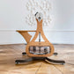 Luxury gym equipment, made with natural oak wood, in a luxury fitness space. NOHRD WaterGrinder.
