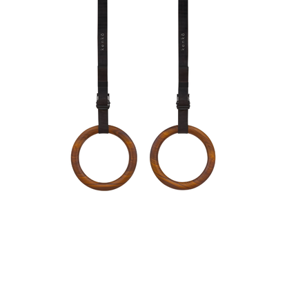 Walnut wood finish kenko gym ring  showcasing deep brown tones and rich grain lines.