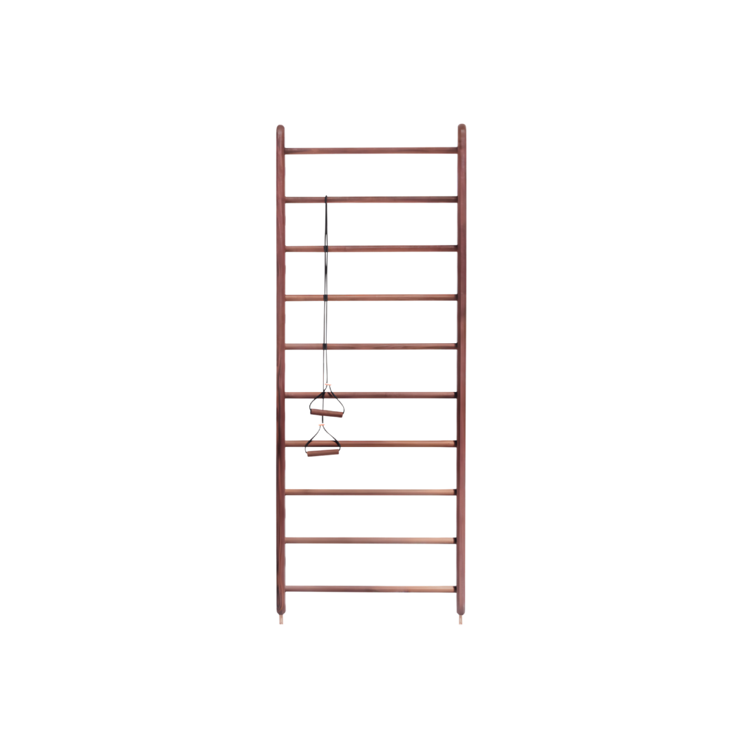 Kenko Wall Bar in walnut wood with gold-plated brass detail on white background.