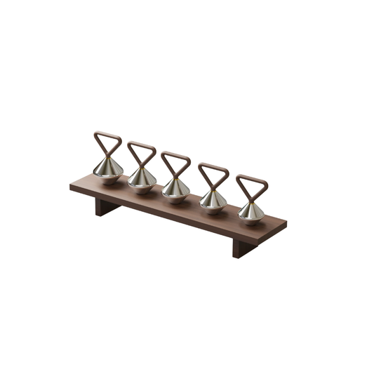 Luxury kettlebell rack with sculptural design, featuring stainless steel, solid wood handles, and brass detailing.