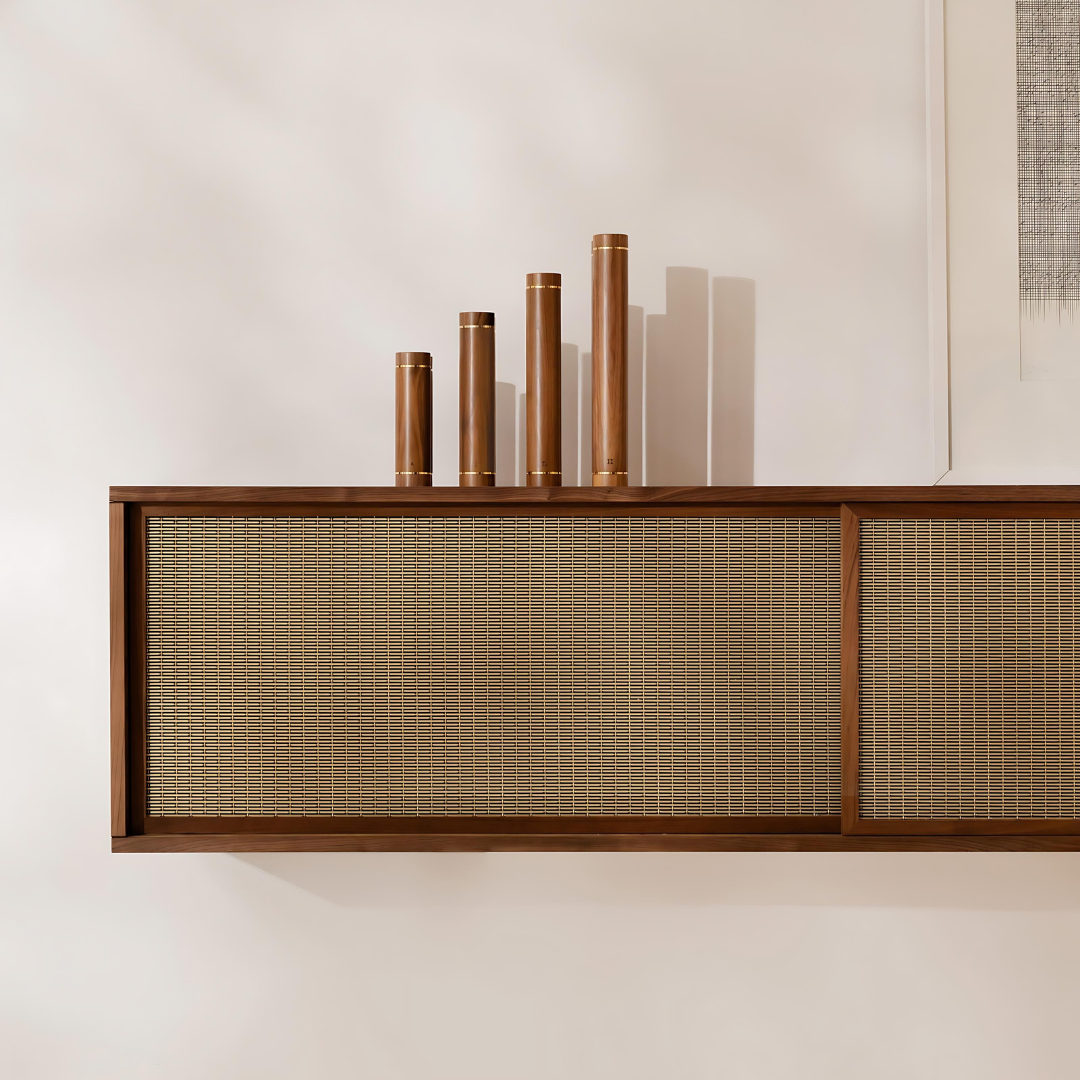 Kenko Aerobic Dumbbells displayed in a luxury home gym or studio space.