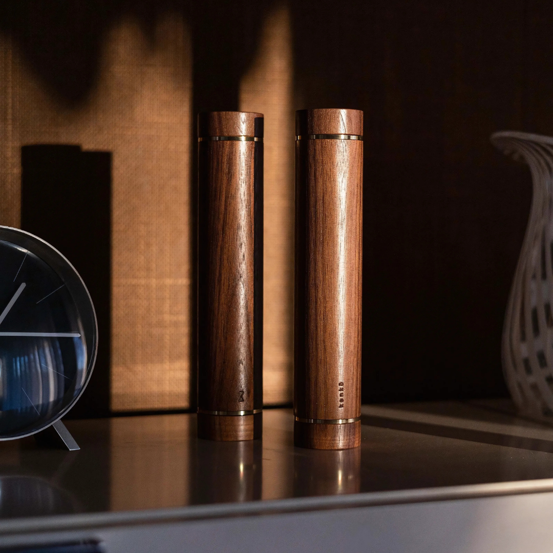 Kenko Aerobic Dumbbells – minimalist design with walnut, maple, or stainless steel finish.