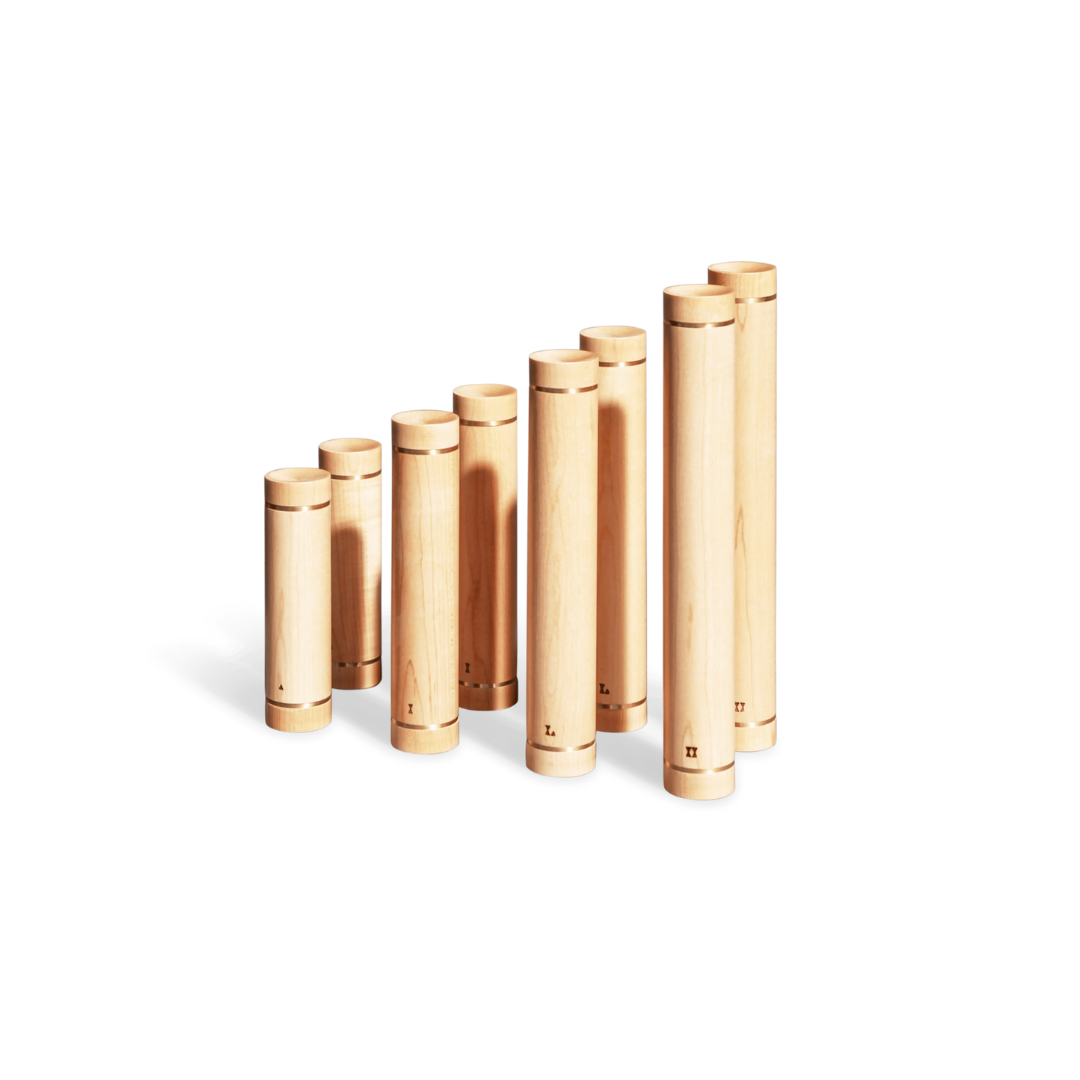 Luxury dumbbells combining solid wood or polished steel with refined craftsmanship.