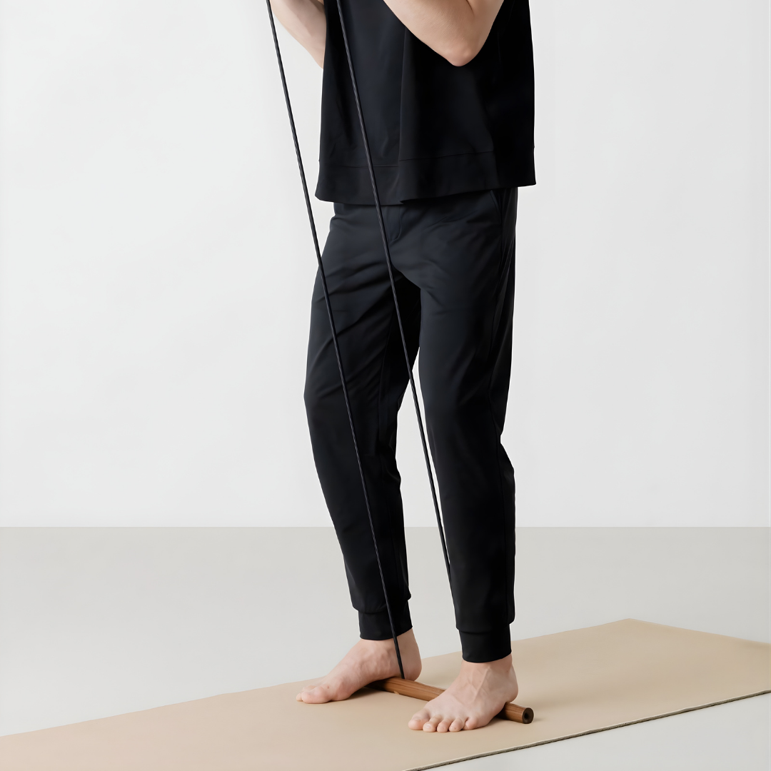 Person performing a resisted side pull with the Kenko Expander Big in both hands.