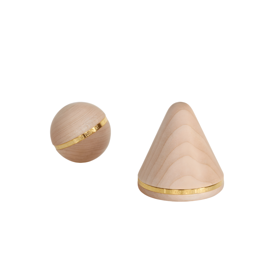 Wood and maple Free Flow Kit tools with brass detail isolated on white.