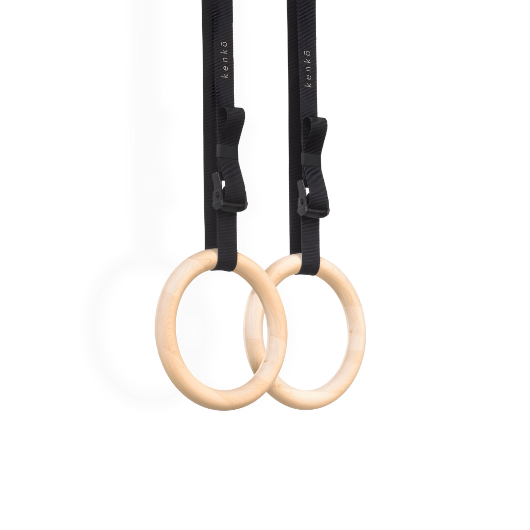 Pair of kenko gym rings crafted from light maple wood.