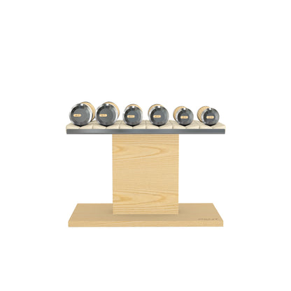 Luxury gym equipment, 3 pair of dumbbells on horizontal wooden stand, made with stainless steel, Italian beige leather and natural ash wood.