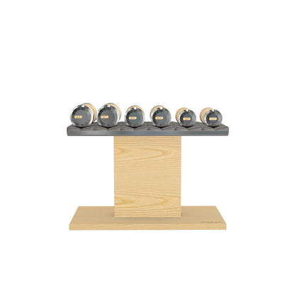 Luxury gym equipment, 3 pair of dumbbells on horizontal wooden stand, made with stainless steel, Italian grey leather and natural ash wood.
