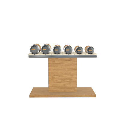 Luxury gym equipment, 3 pair of dumbbells on horizontal wooden stand, made with stainless steel, Italian beige leather and oak wood.