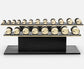 PENT. COLMIA Set - In Gold  - Dumbbells on a Horizontal Wooden Stand