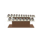Luxury gym equipment, 10 pair of dumbbells on horizontal wooden stand, made with stainless steel, Italian beige leather and natural walnut wood.