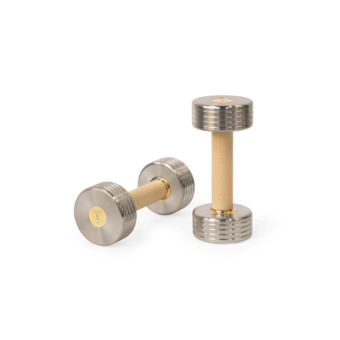 Kenko Dumbbell – luxury dumbbell with maple wood handle, stainless steel body, and brass accents.