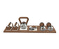Luxury gym equipment set with push-up bars, a kettlebell, set of dumbbells, and a jumping rope on a premium wood stand. With wood materials in natural walnut and stainless steel. PENT. DEHA - Set of Fitness Equipment