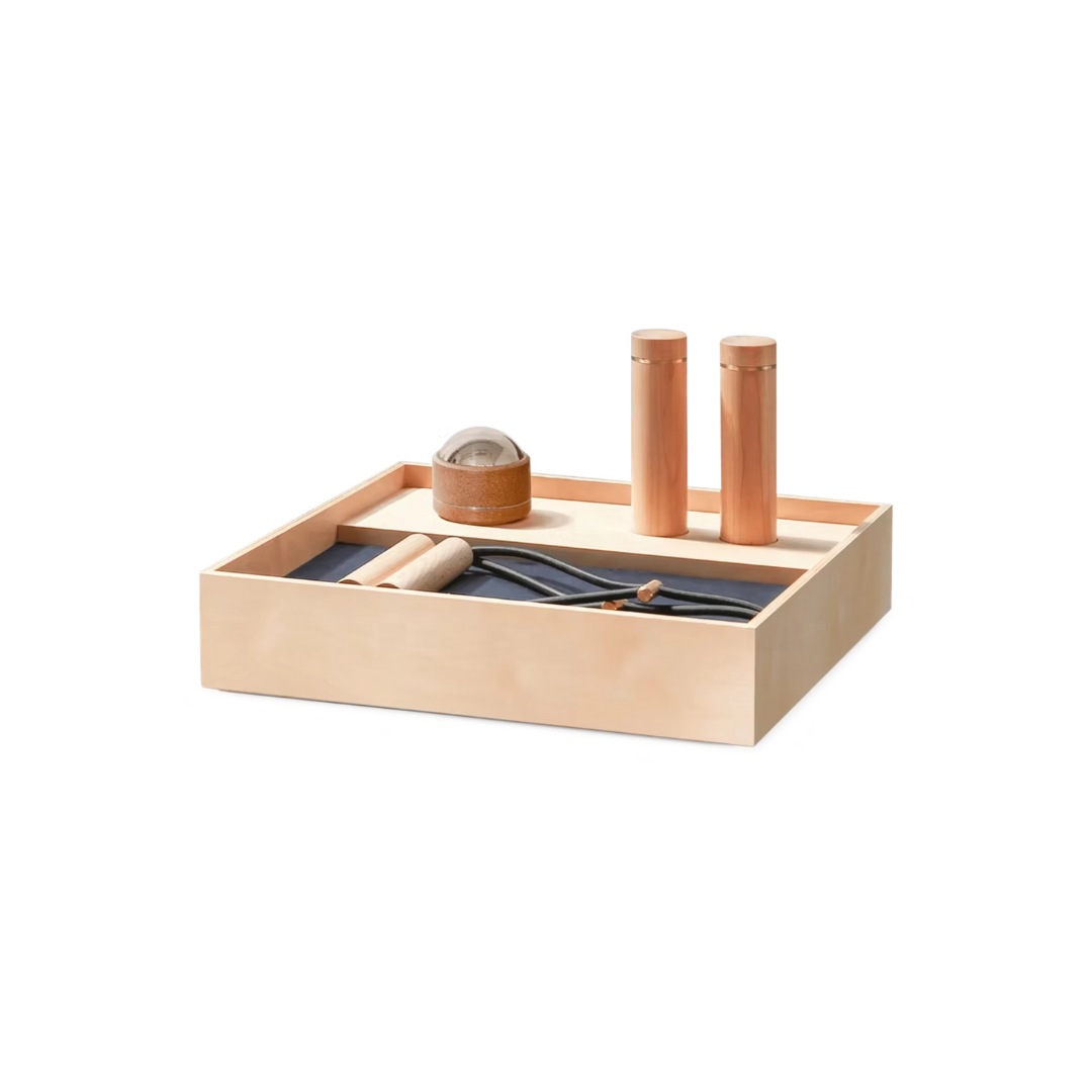 Floor Set A – compact strength training kit with walnut wood box and gold-plated fittings.