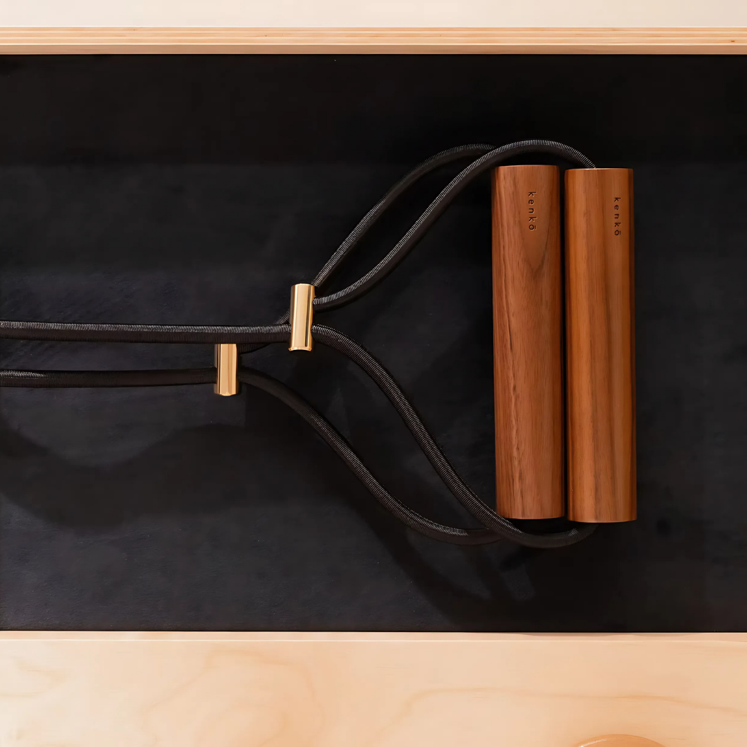 Craftsmanship detail of Floor Set A – walnut wood grain with polished fittings.