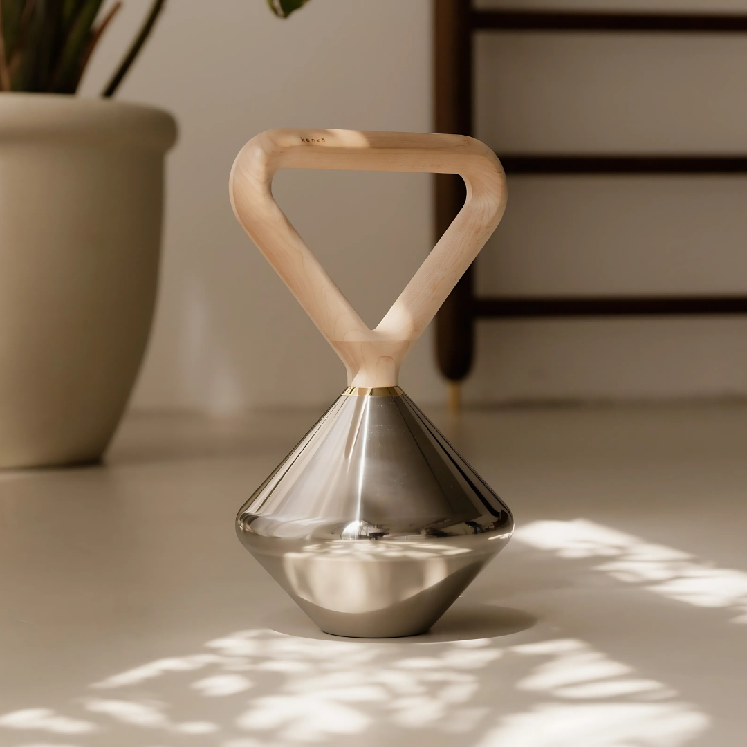 Luxury kettlebell placed in a boutique fitness studio as both tool and décor.