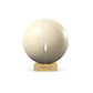 Luxury fitness equipment, fitness ball wrapped in luxurious leather and paired with a compact wooden stand. Customize in beige base leather, white accent leather and natural ash wood. PENT. MESNA