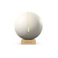 Luxury fitness equipment, fitness ball wrapped in luxurious leather and paired with a compact wooden stand. Customize in white base leather, beige accent leather and natural ash wood. PENT. MESNA