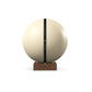 Luxury fitness equipment, fitness ball wrapped in luxurious leather and paired with a compact wooden stand. Customize in beige base leather, black accent leather and natural walnut wood. PENT. MESNA