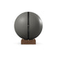 Luxury fitness equipment, fitness ball wrapped in luxurious leather and paired with a compact wooden stand. Customize in grey base leather, black accent leather and natural walnut wood. PENT. MESNA