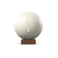Luxury fitness equipment, fitness ball wrapped in luxurious leather and paired with a compact wooden stand. Customize in white base leather, beige accent leather and natural walnut wood. PENT. MESNA