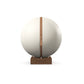 Luxury fitness equipment, fitness ball wrapped in luxurious leather and paired with a compact wooden stand. Customize in white base leather, brown accent leather and natural walnut wood. PENT. MESNA
