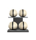 Luxury fitness equipment, 4 leather medicine ball on horizontal wooden stand, handcrafted with premium Italian beige base leather, black accent leather and black ash wood. PENT. MOXA Set