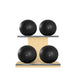 Luxury fitness equipment, 4 leather medicine ball on horizontal wooden stand, handcrafted with premium Italian black base leather, black accent leather and natural ash wood. PENT. MOXA Set