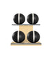 Luxury fitness equipment, 4 leather medicine ball on horizontal wooden stand, handcrafted with premium Italian black base leather, white accent leather and natural ash wood. PENT. MOXA Set