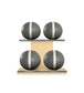 Luxury fitness equipment, 4 leather medicine ball on horizontal wooden stand, handcrafted with premium Italian grey base leather, white accent leather and natural ash wood. PENT. MOXA Set