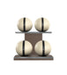 Luxury fitness equipment, 4 leather medicine ball on horizontal wooden stand, handcrafted with premium Italian beige base leather, black accent leather and dark walnut wood. PENT. MOXA Set
