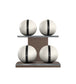 Luxury fitness equipment, 4 leather medicine ball on horizontal wooden stand, handcrafted with premium Italian white base leather, black accent leather and dark walnut wood. PENT. MOXA Set