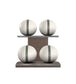 Luxury fitness equipment, 4 leather medicine ball on horizontal wooden stand, handcrafted with premium Italian white base leather, grey accent leather and dark walnut wood. PENT. MOXA Set