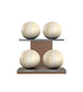 Luxury fitness equipment, 4 leather medicine ball on horizontal wooden stand, handcrafted with premium Italian beige base leather, white accent leather and natural walnut wood. PENT. MOXA Set