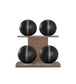 Luxury fitness equipment, 4 leather medicine ball on horizontal wooden stand, handcrafted with premium Italian black base leather, grey accent leather and natural walnut wood. PENT. MOXA Set