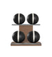 Luxury fitness equipment, 4 leather medicine ball on horizontal wooden stand, handcrafted with premium Italian black base leather, white accent leather and natural walnut wood. PENT. MOXA Set