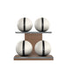 Luxury fitness equipment, 4 leather medicine ball on horizontal wooden stand, handcrafted with premium Italian white base leather, black accent leather and natural walnut wood. PENT. MOXA Set