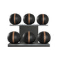 Six black leather medicine balls with brown accent leather, arranged on two shelves made of black ash wood. PENT. MOXA Set Ultimate - Set of 6 Medicine Balls on Horizontal Wooden Stand